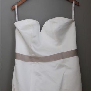 Elegant satin wedding dress with lace overlay